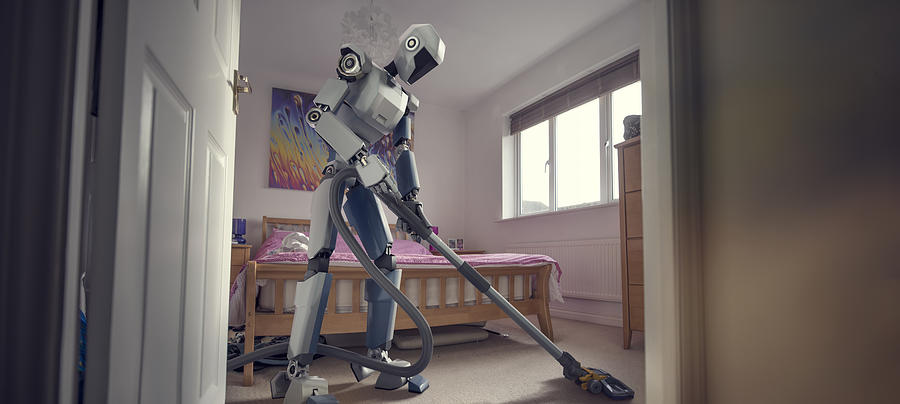 Robot Doing Household Cleaning With Vacuum Cleaner Photograph by Peepo