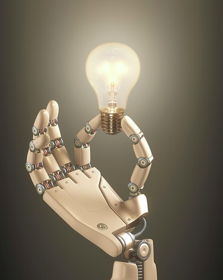 Robotic Hand Holding A Light Bulb Photograph by Ktsdesign