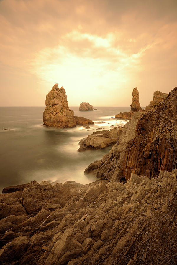 Rock And Sea Photograph by Sergio R.