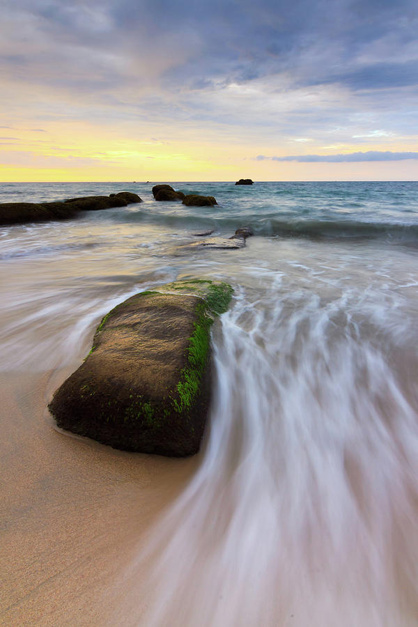 Rock And Waves At A Beach In Borneo Photograph by Macbrian Mun