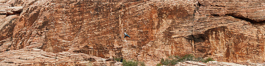 Las Vegas Photograph - Rock Climber Climbing A Rock, Red Rock by Panoramic Images