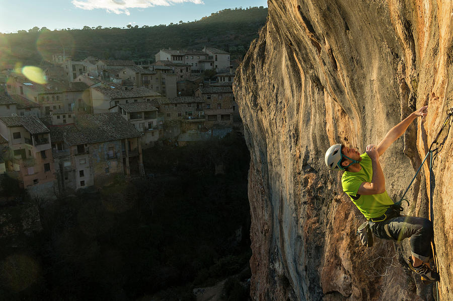 Sunset Photograph - Rock Climber Oscar Baules Leading Kiko by Alejandroruizphoto
