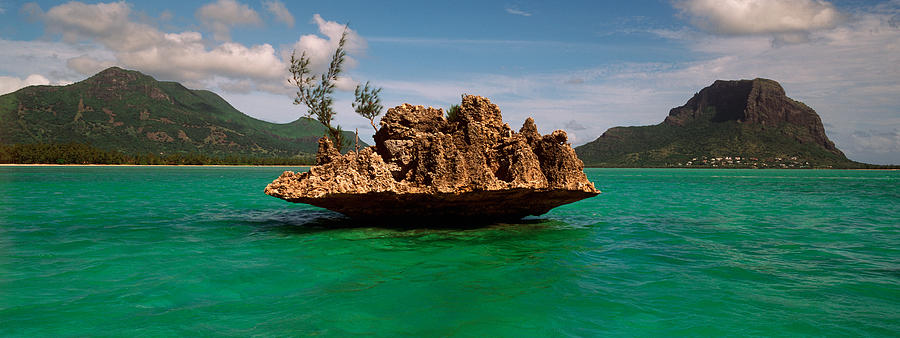 Nature Photograph - Rock In Indian Ocean With Mountain by Panoramic Images