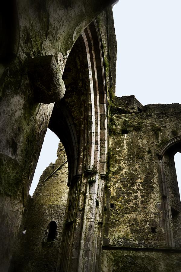 Arches and Stone Walls - Rock of Cashel Photograph by Nadalyn Larsen
