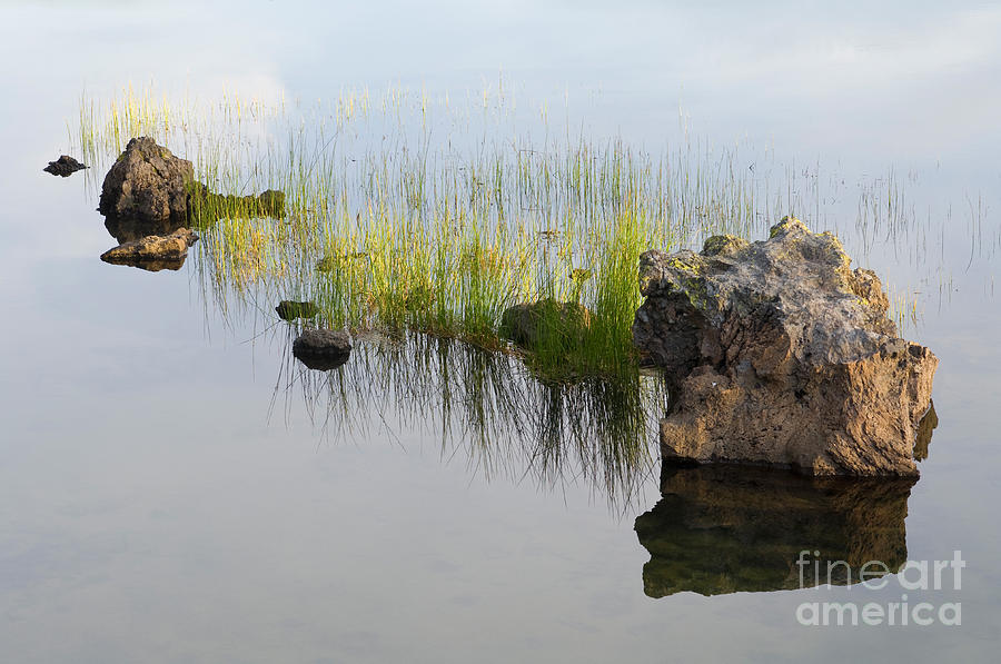 Rocks In Lake Photograph by John Shaw