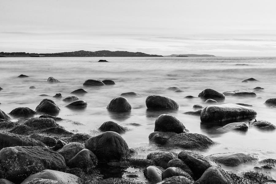 Rocks in the Irish Sea Photograph by Semmick Photo