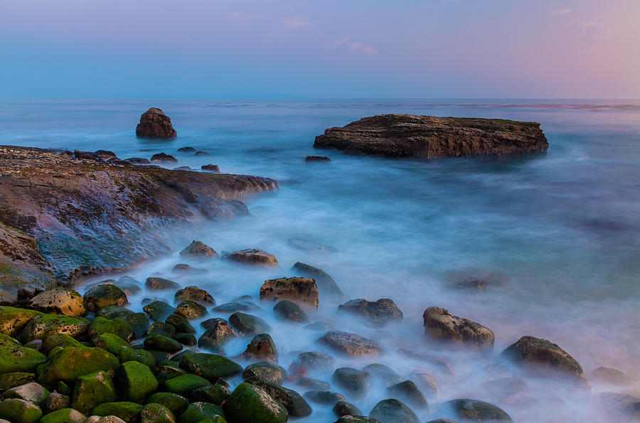 Rocky shoreline Photograph by Jonathan Nguyen