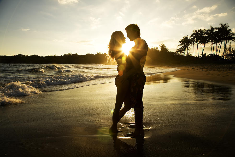 Romantic Couple at Sunset Photograph by Jhorrocks