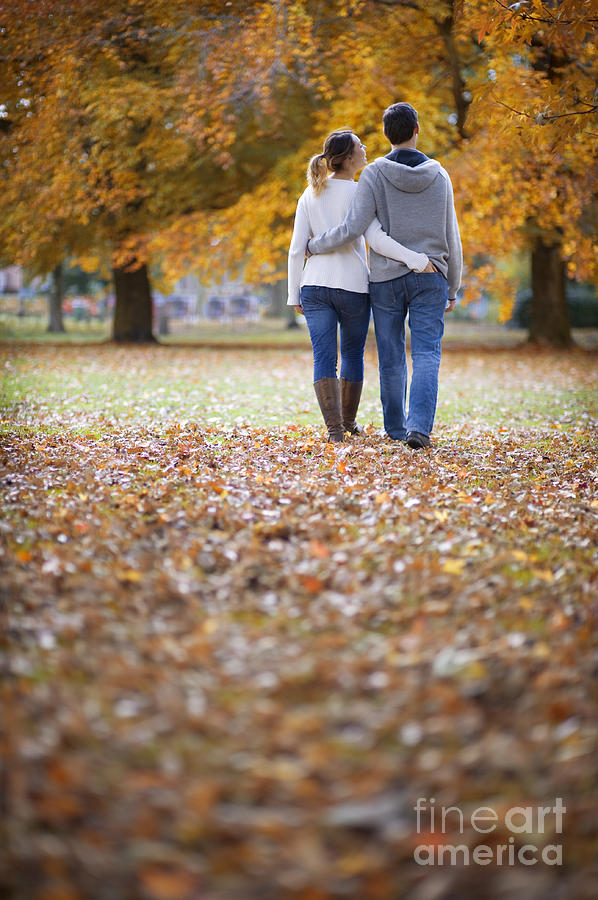 Romantic Couple On An Autumn Walk Photograph by Lee Avison