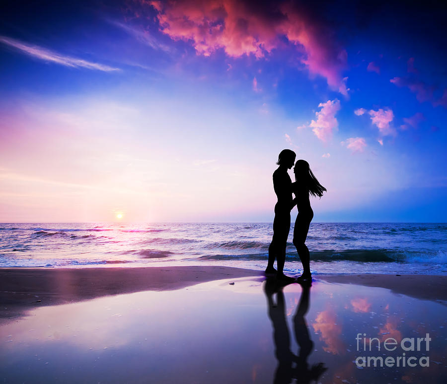 Sunset Photograph - Romantic couple on beach at sunset by Michal Bednarek