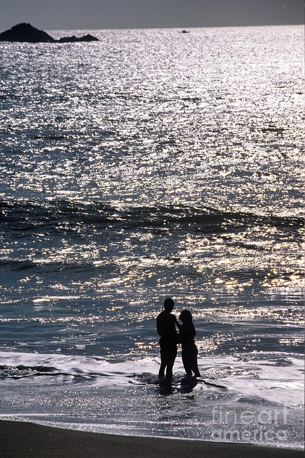 Romantic Couple on the Beach Photograph by John Harmon