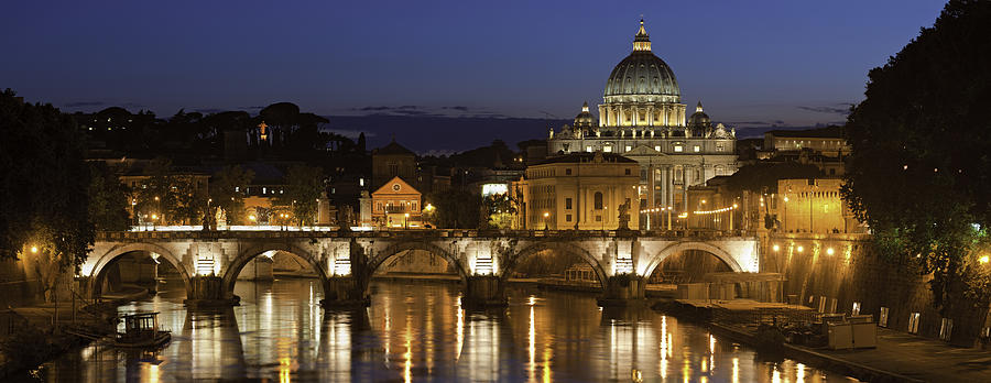 Rome illuminated dusk over River Tiber St Peters Vatican Italy Photograph by fotoVoyager