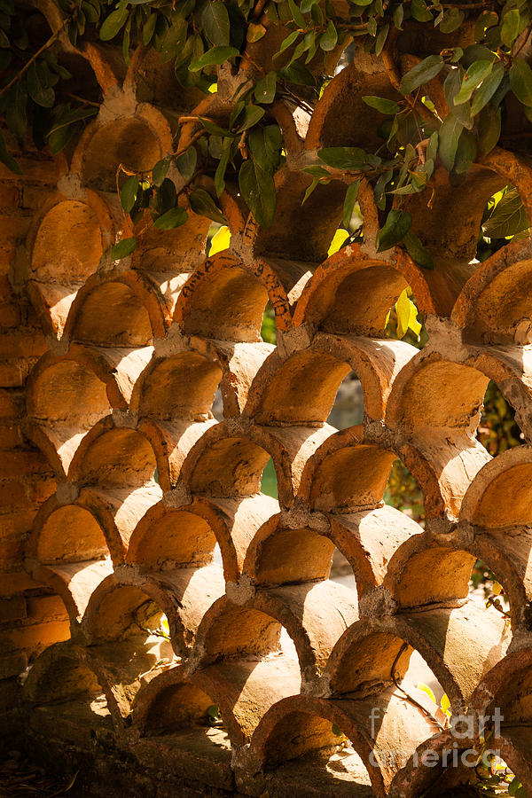roof capping tiles built as a pattern wall at Villa dEste Tivol Photograph by Peter Noyce