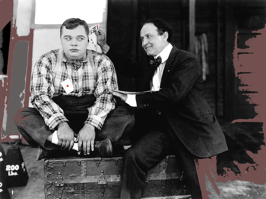 Roscoe Arbuckle and Harry Houdini doing card tricks unknown date-2013 Photograph by David Lee Guss