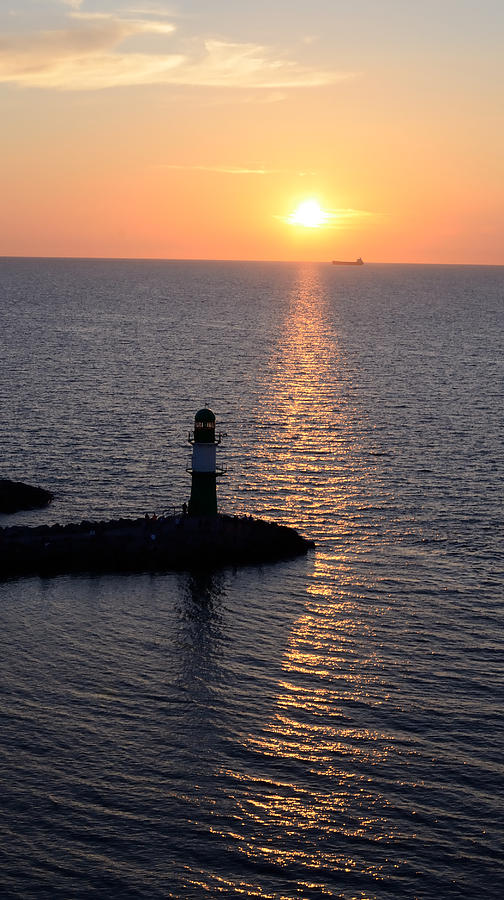 Rostock Germany Sunset Lighthouse Photograph by Tom Wurl