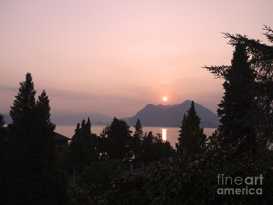 Rosy fingered Dawn over Lake Maggiore Photograph by Brenda Kean