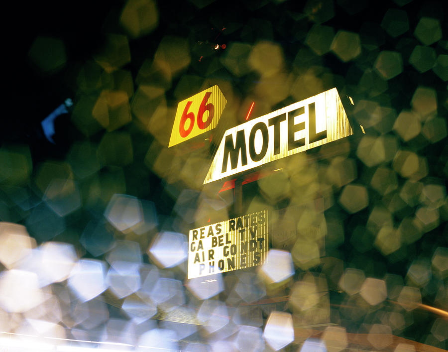 Route 66 Hotel Sign Through Car Window Photograph by Gary Yeowell