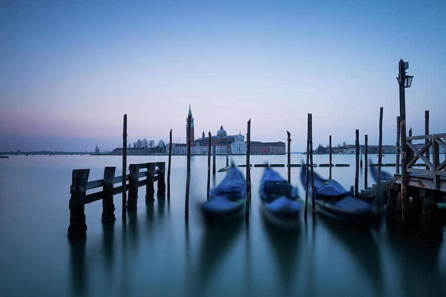 Row Of Gondolas At Sunrise In Venice Photograph by Matteo Colombo