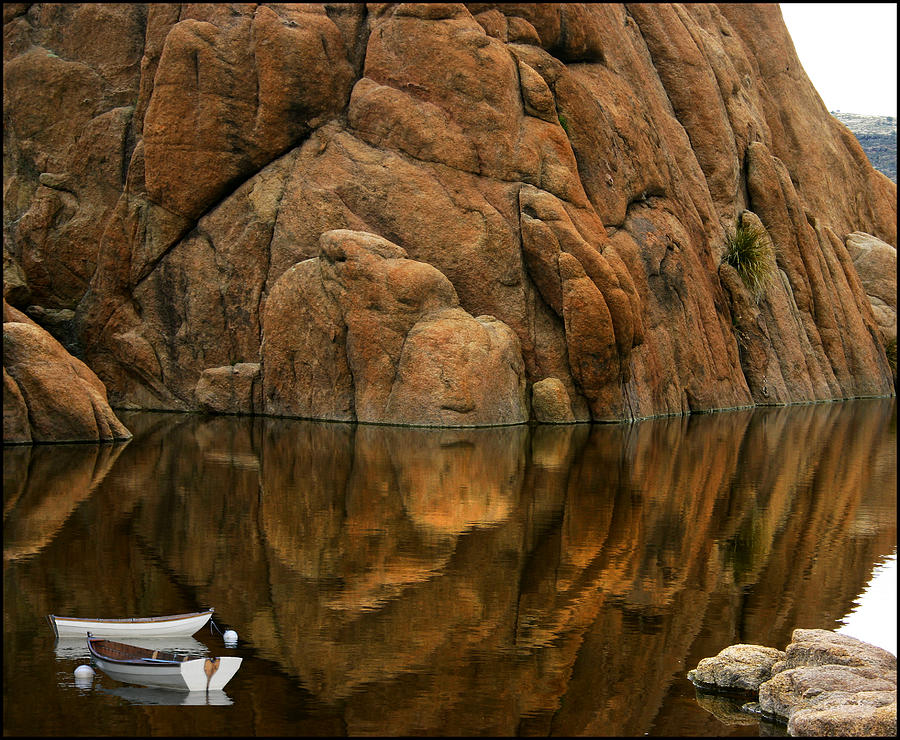 Rowboat Reflections Beneath a Dells Monolith  Photograph by Wayne King