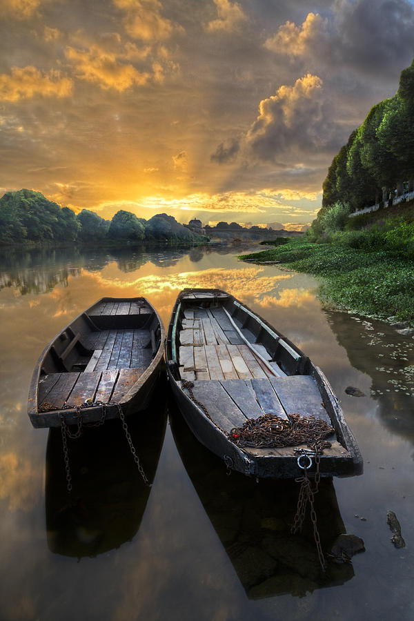 Rowboats on the River Photograph by Debra and Dave Vanderlaan
