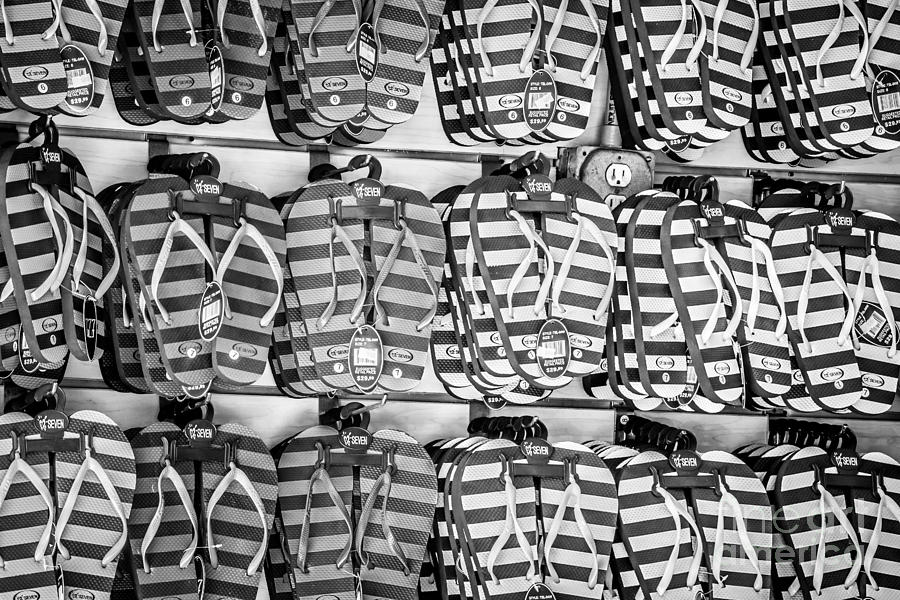 Black And White Photograph - Rows of Flip-flops Key West - Black and White by Ian Monk