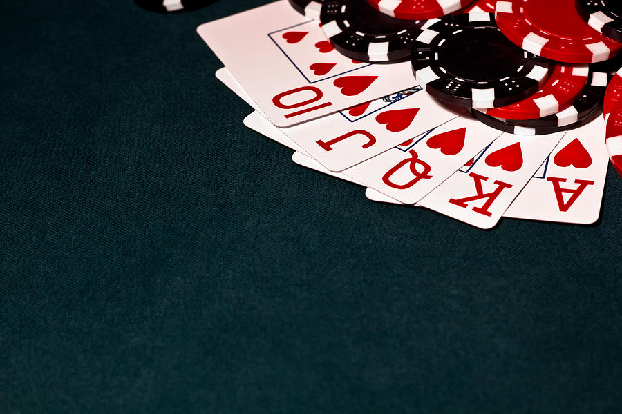 Royal Flush with Black and red Poker Chips Photograph by Xccelerated