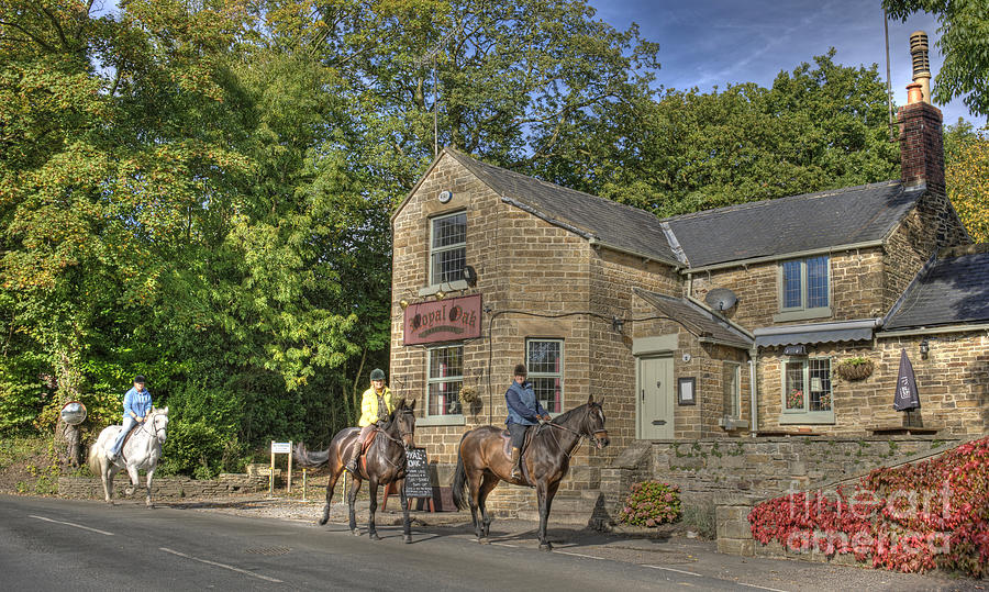 Horse riders at Royal Oak pub. Photograph by David Birchall