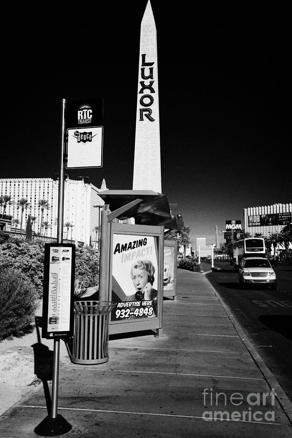 Transportation Photograph - rtc deuce sdx bus stop outside the luxor hotel on Las Vegas boulevard Nevada USA by Joe Fox