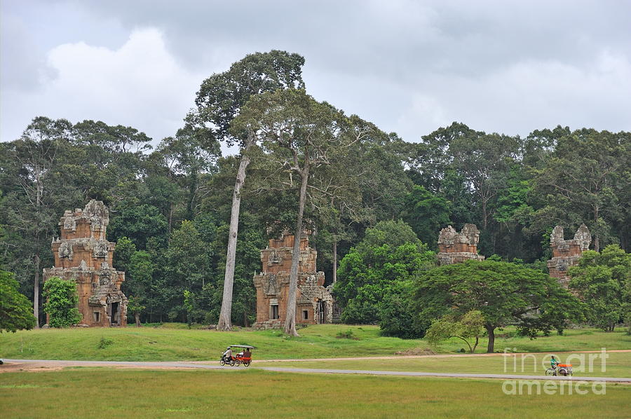 Tree Photograph - Ruins and tourists at Angkor Wat by Sami Sarkis