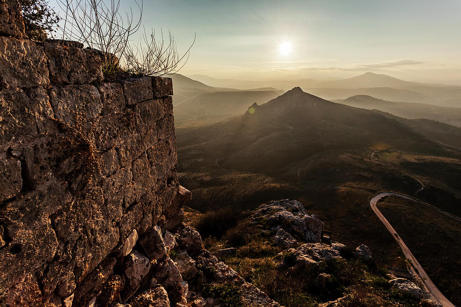 Ruins Of A Stone Wall With A Sunburst Photograph by Reynold Mainse