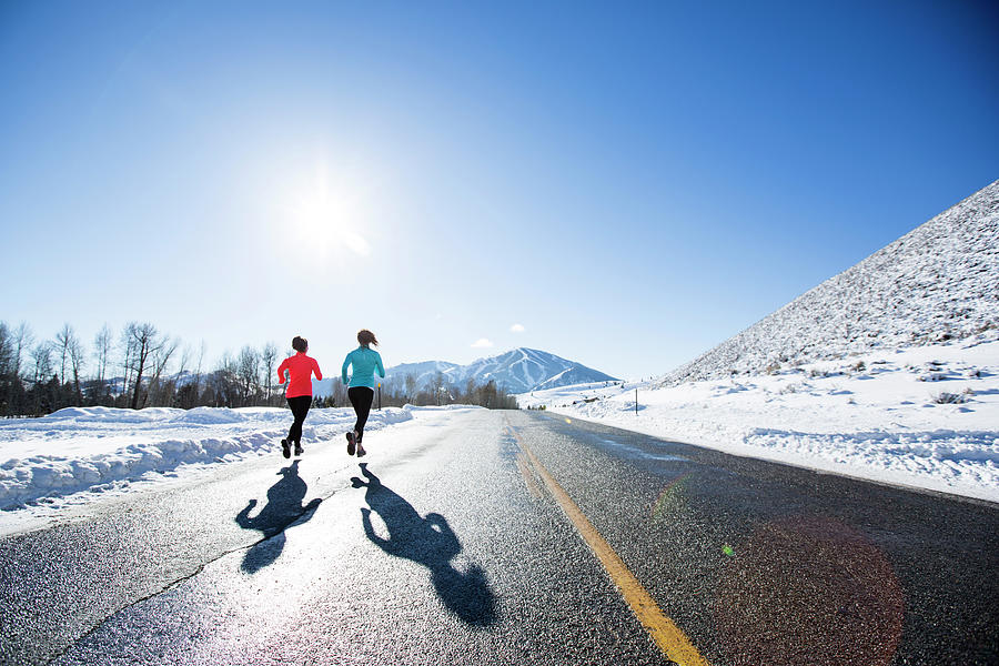Running In The Winter Photograph by Jordan Siemens