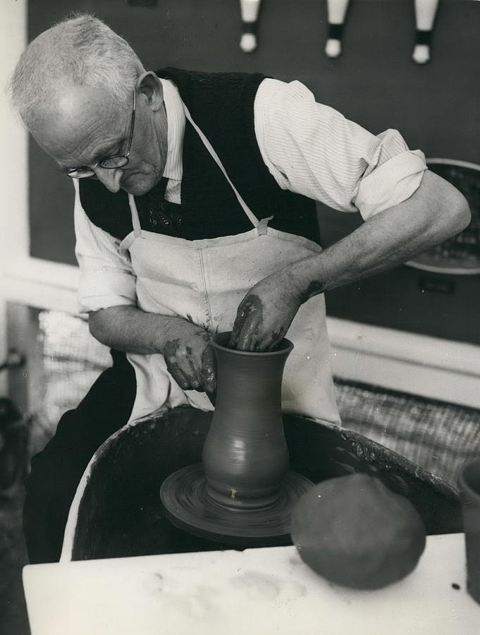 Rural Industries Exhibition In London A Potter At Work Photograph by Retro Images Archive
