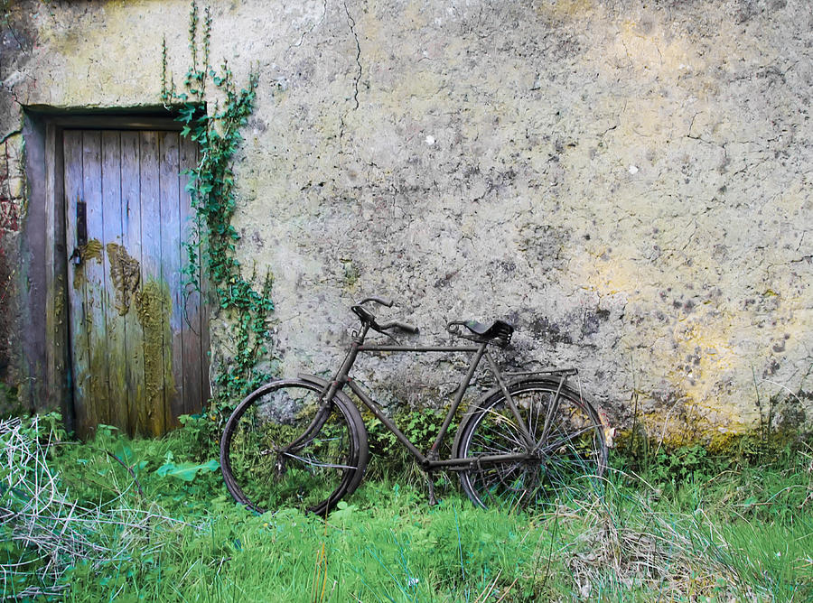 Rusted  Bike by the Door Photograph by Bill Cannon