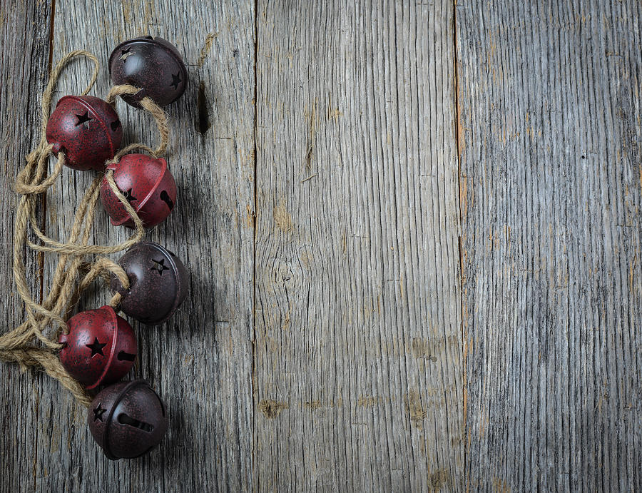 Christmas Photograph - Rustic Christmas Bells and Wood Background by Brandon Bourdages