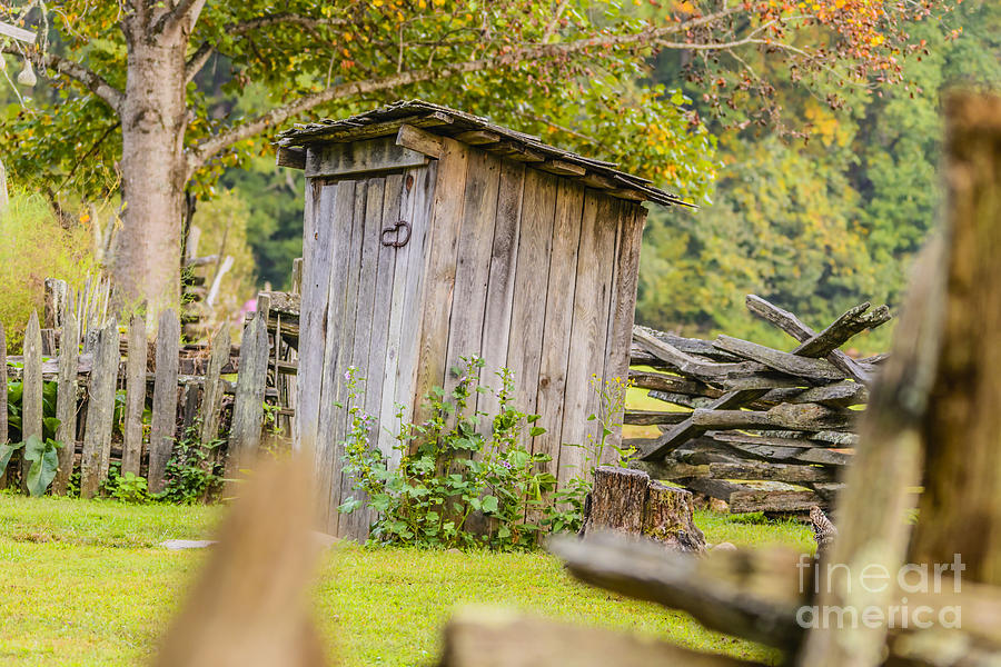 Fall Photograph - Rustic Fence and Outhouse by Elvis Vaughn