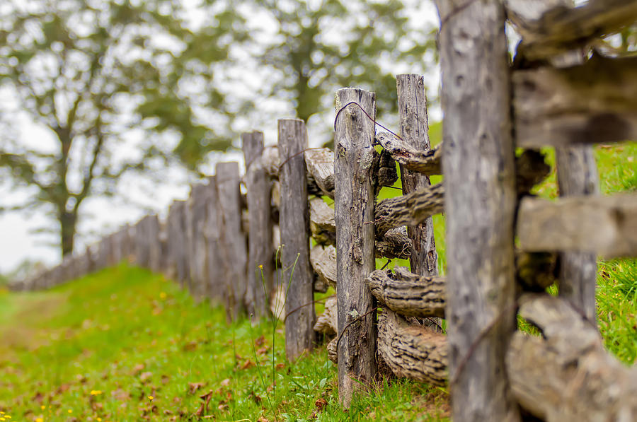 Rustic home made split rail fence in the mountains of North Caro Photograph by Alex Grichenko