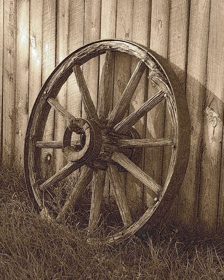 Rustic Wagon Wheel Photograph by Greni Graph