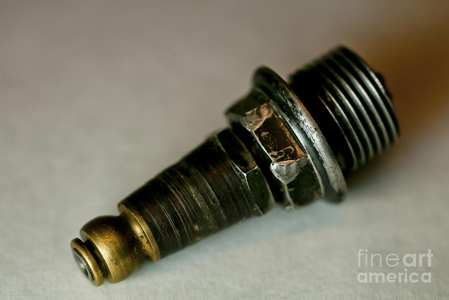Rusty Old Spark Plugs Photograph by Wilma  Birdwell