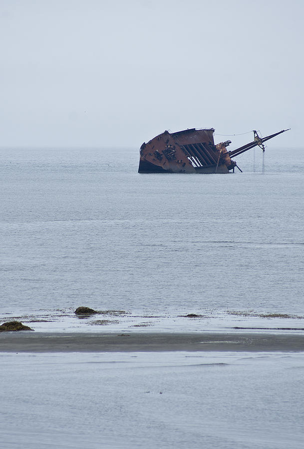 Rusty shipwreck Photograph by Arkady Kunysz