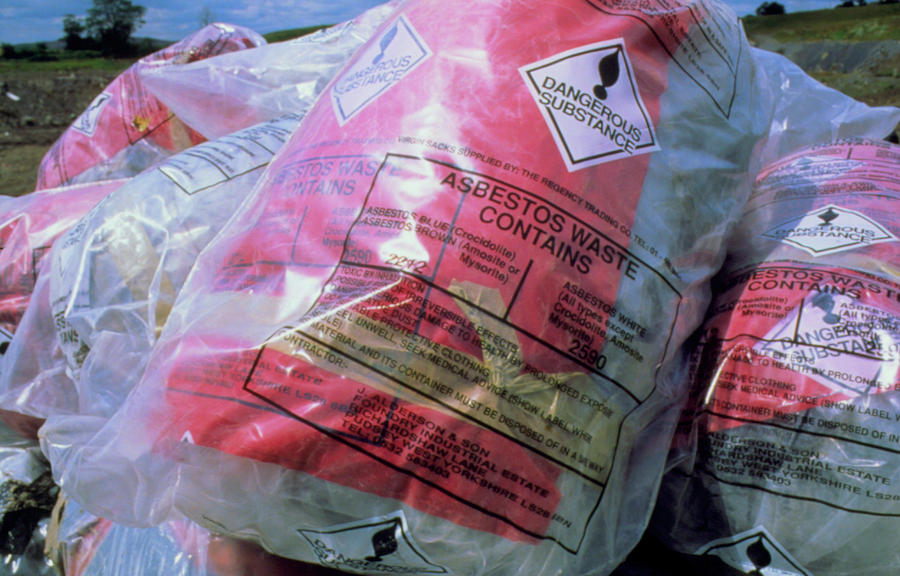 Sacks Of Asbestos Awaiting Burial At Landfill Site Photograph by Adam