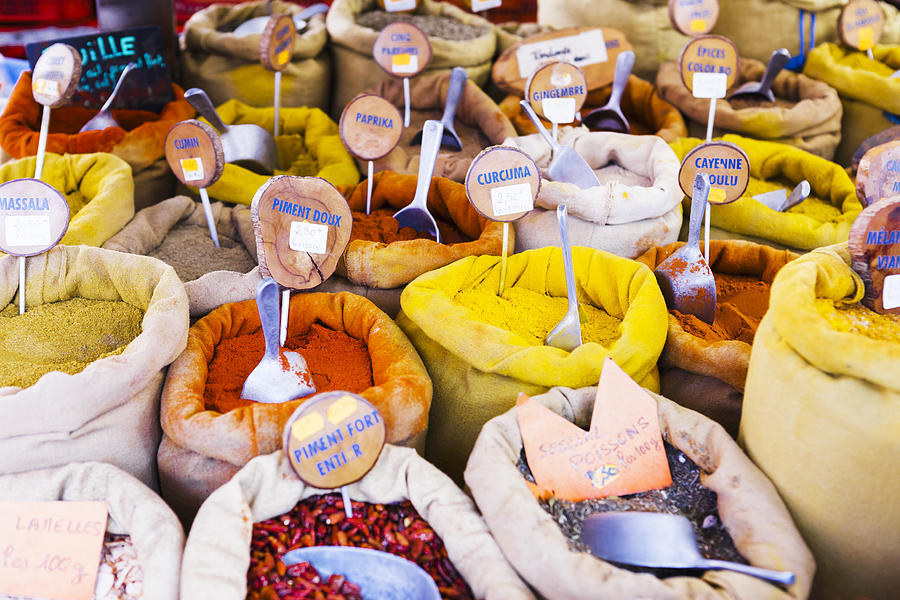Sacks of multicolored spices on market Photograph by Alexandra C. Ribeiro