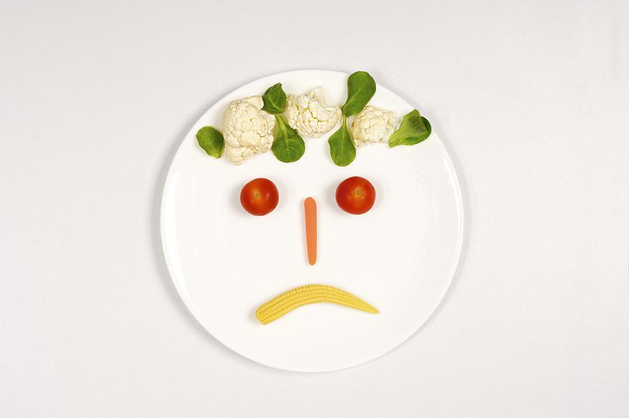 Sad food face by Science Photo Library