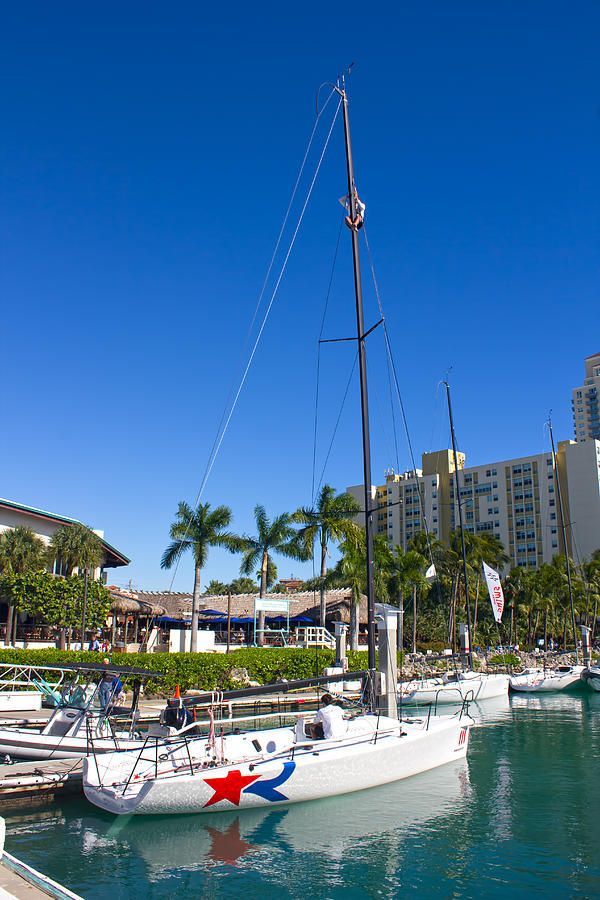 Miami Beach Marina Sailboat with Red Star Photograph by Carlos Diaz
