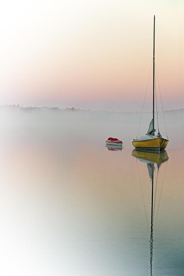 sailboats in fog
