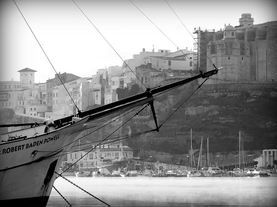 Sir Robert Sail boat in black and white in the stunning port mahon - Menorca - sailboat and the city Photograph by Pedro Cardona Llambias