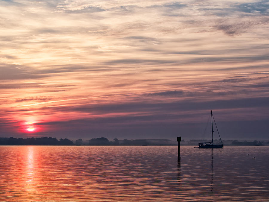 Sailboat at Dawn Photograph by David Kay