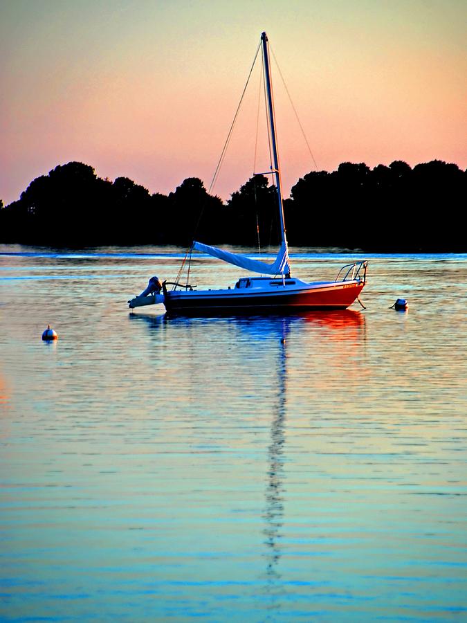 Sailboat at sunset Photograph by Bill Jonscher