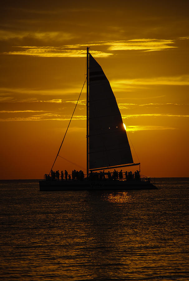 Sailboat at Sunset Photograph by Phil Abrams