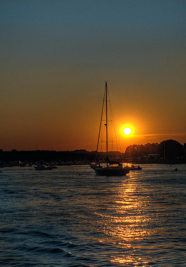 Sailboat at Sunset Photograph by Rick Mosher