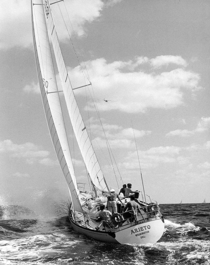 Vintage Photograph - Sailboat charging the waves by Retro Images Archive